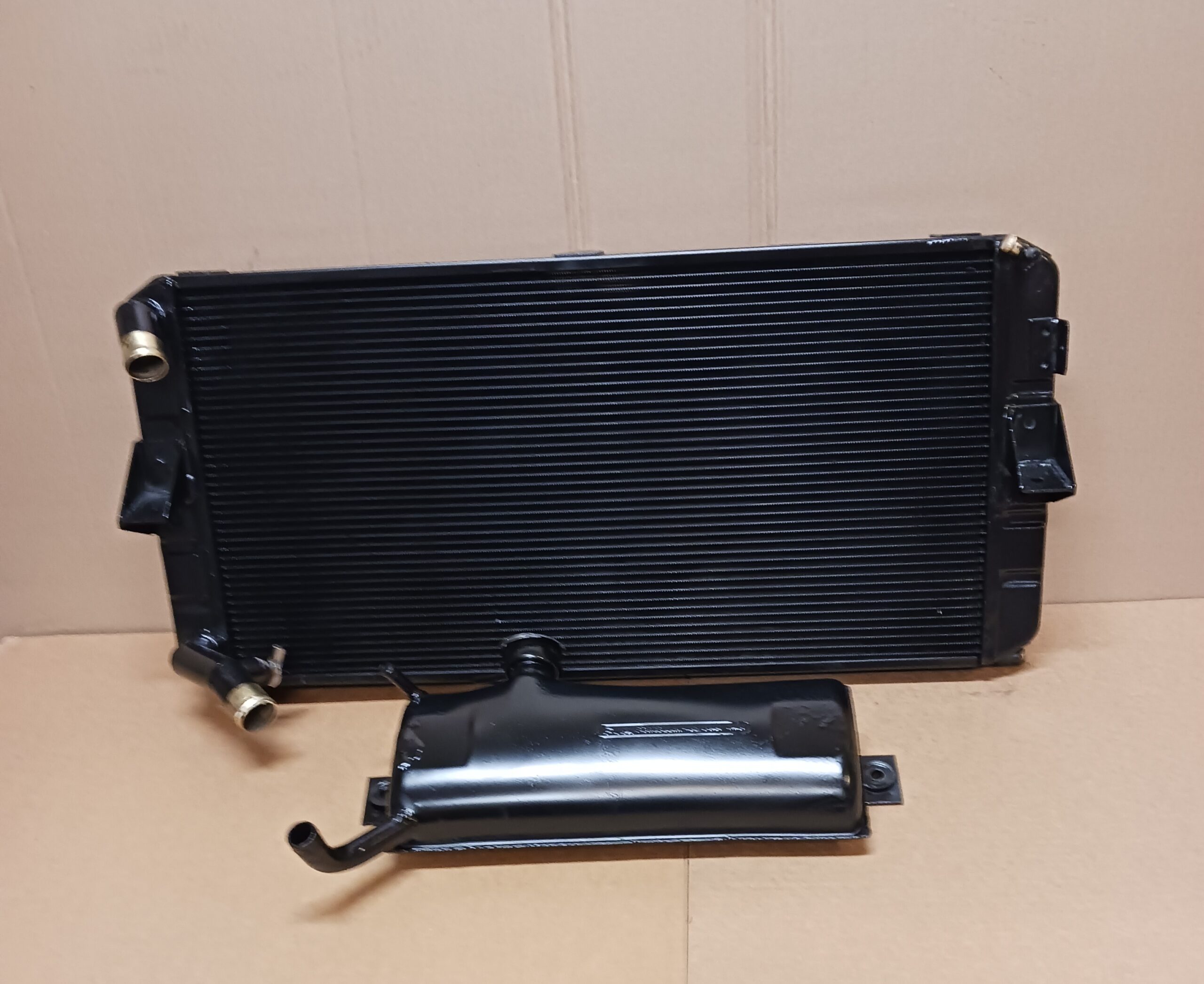 Rear View 1974 Ferrari Dino radiator and recovery tank restored